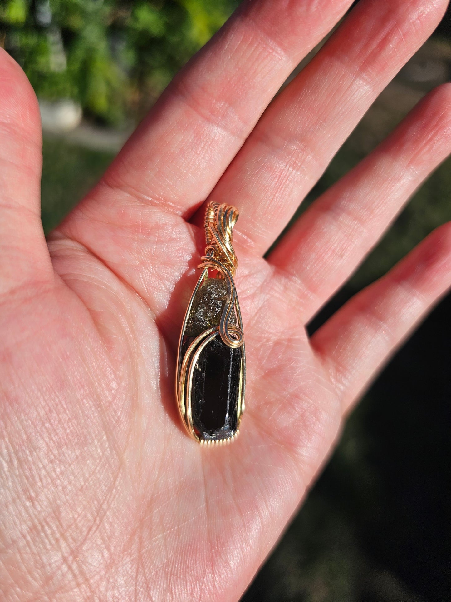Black tourmaline and moldavite