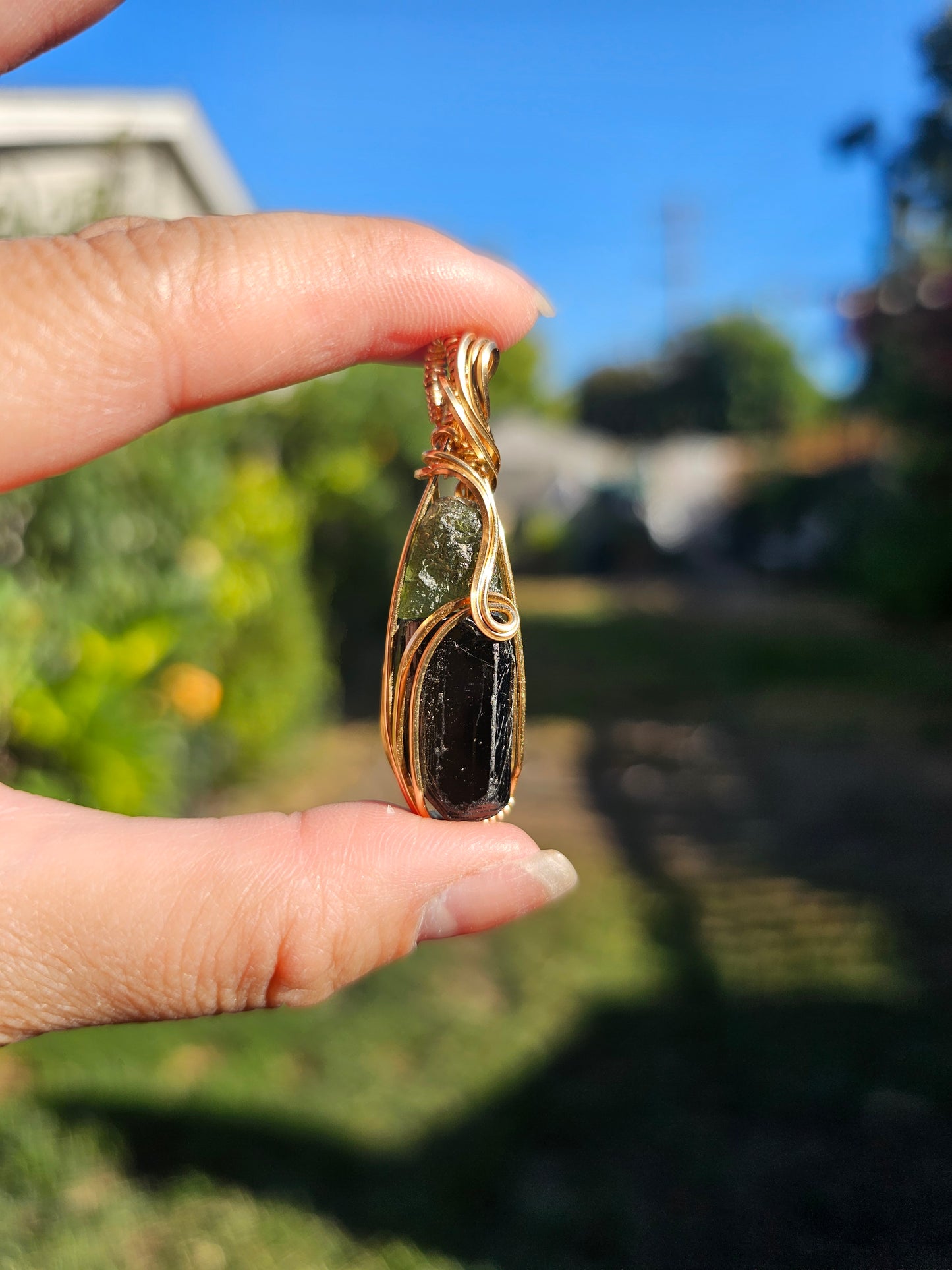 Black tourmaline and moldavite