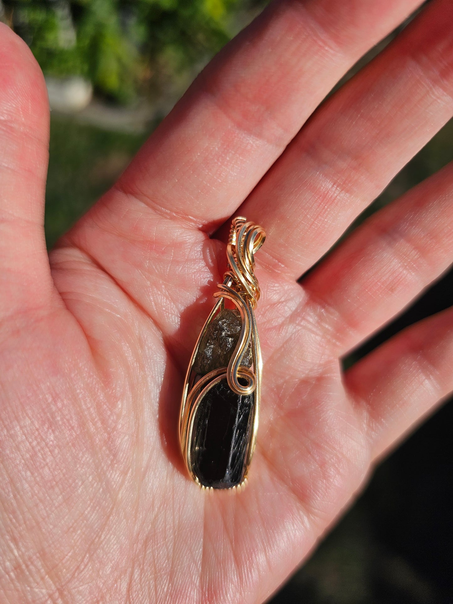 Black tourmaline and moldavite