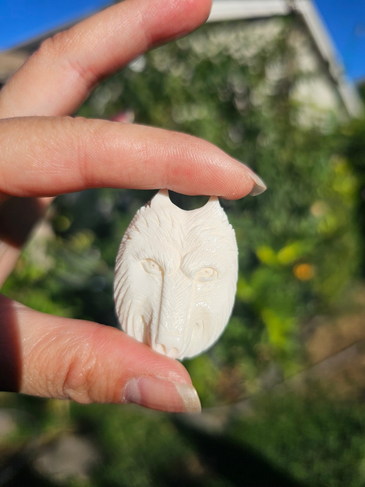 Bone wolf Carving